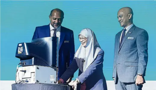  ??  ?? deputy Prime minister datuk seri dr Wan azizah Wan Ismail (centre), together with Gobind (left) and mcmc chairman al-ishsal Ishak at the NFCP launch in Putrajaya earlier in september this year.