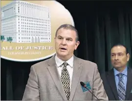  ?? Mel Melcon Los Angeles Times ?? CHRISTOPHE­R BERGNER, left, a captain with the Los Angeles County Sheriff’s Department, speaks at a news conference Monday on the Natalie Wood case.