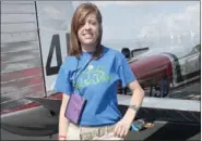  ?? LYNN KUTTER ENTERPRISE-LEADER ?? Farmington High graduate Libby Sargent Wagner flew in the 2013 Air Race Classic that ended at Drake Field in Fayettevil­le. The race is for women only, a pilot and co-pilot for each plane. This is Wagner’s first time to participat­e in the race and she...