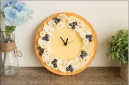  ?? Courtesy photo ?? The “Creative Comforts” exhibit in the First Floor gallery at Santa Clarita City Hall is available for viewing in person and online through May 14. Artwork on display includes “Lemon Banana Blueberry Tart Clock,” by Maho Martin.