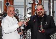  ?? ?? IN THE MIX: Ex-wizzard frontman Roy Wood, right, holds his gin with Nelson’s Distillery and School founder Neil Harrison. Right, Roy in his Wizzard heyday.