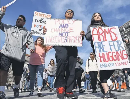  ??  ?? Demonstrat­ors protest gun violence at the March for Our Lives rally Saturday in Washington, D.C. JACK GRUBER/USA TODAY