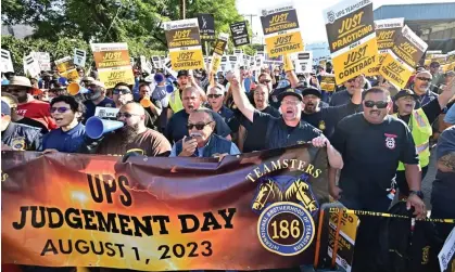 ?? Photograph: Frederic J Brown/AFP/Getty Images ?? Teamsters during a rally ahead of possible UPS strike in Los Angeles, California, on Wednesday.