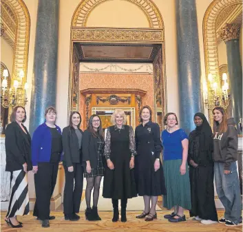  ?? ?? SUPPORT: The Queen meets young Changemake­rs, executives and trustees from the charity SafeLives at Buckingham Palace. Camilla has been patron of the charity, which campaigns to end domestic abuse, since 2020.