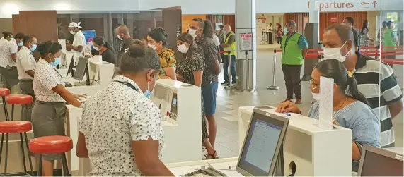  ?? Photo: Nicolette Chambers ?? Passengers checking in at the Nadi Internatio­nal Airport on January 2,2021.