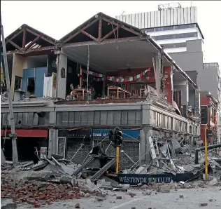  ?? SUPPLIED ?? Buildings on the corner of Manchester and Worcester streets lost their brick exteriors in the September 4, 2010, earthquake.