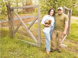  ?? PAUL W. GILLESPIE/CAPITAL
GAZETTE ?? Bridget and Matt Jones operate Wildberry Farm in Crownsvill­e and have adapted their business to accommodat­e the changing climate due to COVID-19 Saturday.