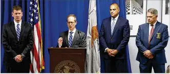  ?? TY GREENLEES / STAFF ?? U.S. Attorney Benjamin C. Glassman talks about the arrest of Ethan Kollie, a friend of Conner Betts. With Glassman (from left) are Todd Wickerham, special agent in charge, FBI; Vipal Patel, first assistant U.S. attorney; and Dayton Police Chief Richard Biehl.