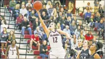  ?? [IAN MAULE/TULSA WORLD] ?? Holland Hall's Gabby Gregory shoots against Victory Christian earlier this season.