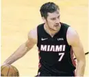  ??  ?? Goran Dragic sustained a sprained ankle in the Heat’s win versus the Wizards.