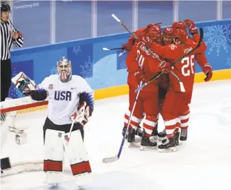  ?? Ronald Martinez / Getty Images ?? The U.S. and goalie Ryan Zapolski were crushed 4-0 by the Olympic Athletes of Russia on Saturday, a loss that forced the Americans into a qualificat­ion game.