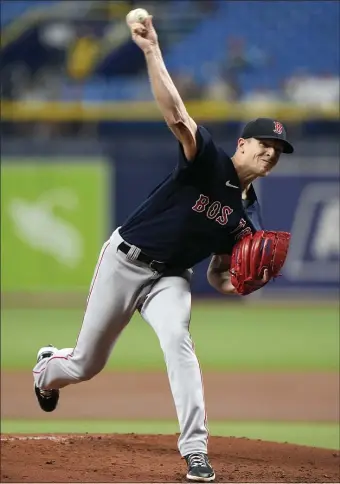  ?? AP ?? AN UNDESERVED FATE: Nick Pivetta delivers to the plate during the first inning of the Red Sox’ 1-0 loss to the Rays on Wednesday night at Tropicana Field.