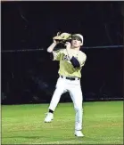  ?? Barbara hall ?? above: A Calhoun outfielder makes a nice running catch during a recent Yellow Jacket game. left: A Calhoun pitcher fires a strike during a recent Yellow Jacket ballgame.