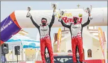  ?? KUNA photo ?? Kuwaiti rally champion Mishari Al-Thifeeri and his Qatari navigator Nasser Al-Kuwari celebrate winning the MERC 2 internatio­nal rally in Cyprus.