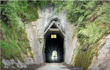  ??  ?? The Hobbit’s Hole tunnel on the way to Whangamo¯ mona.