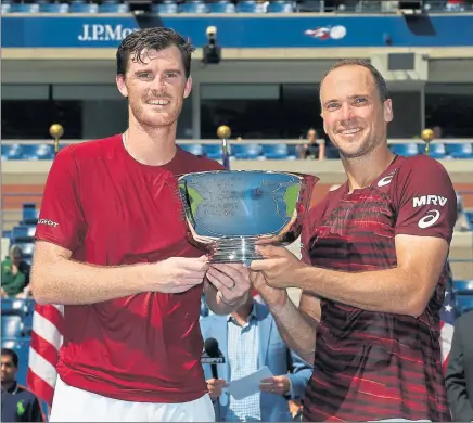  ??  ?? HAPPY TOGETHER: Jamie Murray and Bruno Soares have won two grand slams in their year as doubles partners.