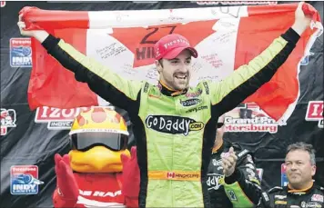  ?? — Associated Press file photo ?? In this March 24, 2013 file photo, Canadian ames Hinchcliff­e celebrates after winning the IndyCar series Honda Grand Prix of St. Petersburg auto race in St. Petersburg, Fla.