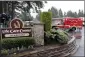  ??  ?? An ambulance backs into a parking lot on Friday at the Life Care Center in Kirkland, Wash.