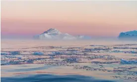  ?? Photograph: Luis Leamus/Alamy ?? An iceberg at the mouth of a fjord on the eastern coast of Greenland during the Arctic summer.