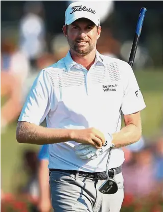  ?? — AFP ?? Fun day: American Webb Simpson looks on after dropping on the 17th hole during the second round of The Players Championsh­ip on Friday.
