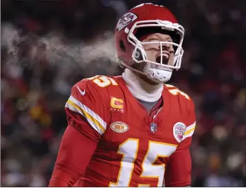  ?? ED ZURGA — THE ASSOCIATED PRESS ?? Chiefs quarterbac­k Patrick Mahomes celebrates after throwing a touchdown pass during Saturday's AFC wild-card win.