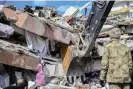  ?? Photograph: Anadolu Agency/Getty Images ?? view of a collapsed building at Hatay, Turkey, on 7 February 2023.