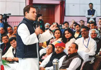  ?? PTI ?? Congress President Rahul Gandhi interacts with members of the business community ■ and profession­als in Udaipur yesterday. Rahul claimed that Prime Minister Narendra Modi believed himself to be more knowledgea­ble than the army on military matters.