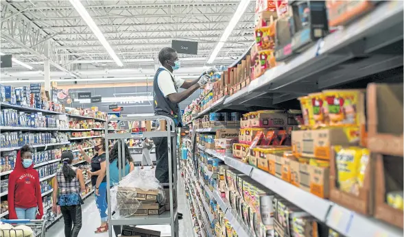  ??  ?? A Walmart in North Brunswick, N.J., this week. General merchandis­e stores have increased employment since February.