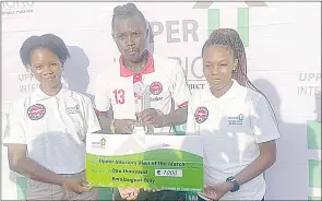  ?? (Pic: Sanele Jele) ?? Mbabane Swallows Skipper Kwayki Kingsley was awarded the Man of the Match in their MTN Premier League match against Royal Leopard, courtesy of Upper Interiors. He is flanked by Upper Interiors’ Nolwazi Malaza (R) and Fezile Dlamini.