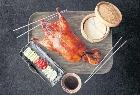  ?? ?? Peking duck is offered at special discount price at Yok Chinese restaurant, the Emerald hotel.