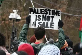  ?? Photograph: Kyle Mazza/NurPhoto/REX/Shuttersto­ck ?? ▲ Pro-Palestinia­n protesters demonstrat­e in front of Congregati­on Keter Torah in Teaneck, New Jersey, on 10 March 2024.