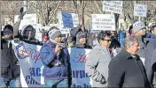  ?? PTI ?? Highlyskil­led Indian workers hold a rally to end the percountry limit on legal permanent residency near the White House.