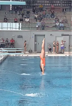  ?? PHOTO PROVIDED BY BYRON HIGH SCHOOL ATHLETICS ?? Byron junior Addison Bausman makes a dive during the Hinsdale Invitation­al on Oct. 7 in Hinsdale, where she placed 10th out of 54 divers.