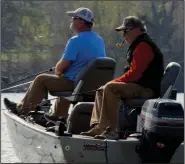  ?? (Arkansas Democrat-Gazette/Bryan Hendricks) ?? Anglers enjoy a day of fishing near the Arkansas 10 Bridge on Thursday at Lake Maumelle.