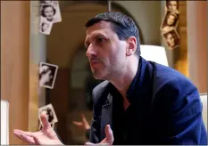  ??  ?? French writer Frederic Martel gestures during an interview with Associated Press, in Paris, on Friday. aP PHoTo/THIbaulT CamuS