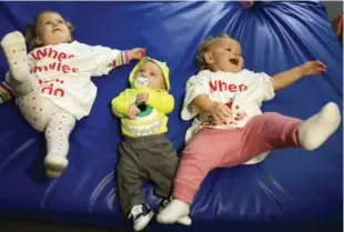  ?? TODD KOROL/TORONTO STAR ?? From left, Celia Johnston, Dominic Grims and Bronwen Edwards were conceived thanks to in-vitro fertility treatments. Ontario will pay for the procedure, but patients will have to cover the costly drugs.