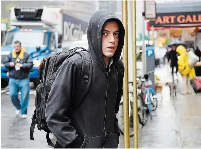  ?? SARAH SHATZ TNS ?? Rami Malek in “Mr. Robot.” Sam Esmail produced, wrote and directed episodes of the award-winning series.