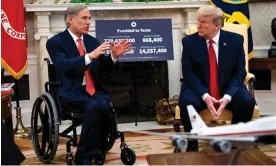  ?? ?? Greg Abbott and Donald Trump at the White House in 2020. Photograph: Doug Mills/EPA
