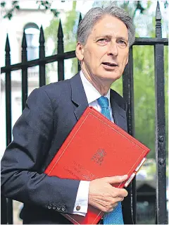  ?? Picture: GETTY ?? NOT HIS CHOICE: Chancellor Philip Hammond is said to accept open borders, which the nation voted against