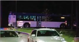  ?? PTI ?? A bus transports people from the scene of a shooting at the FedEx Ground facility in Indianapol­is