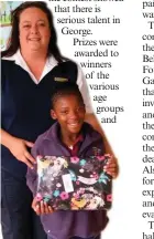  ??  ?? Audrey Umtwa from Carpe Diem School was awarded a special prize. With her is SPCA inspector Gerda Reinders.