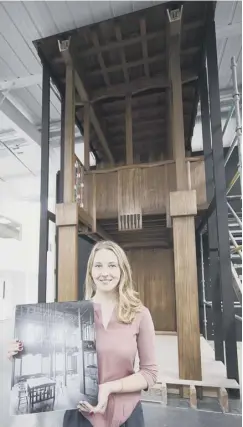  ??  ?? Natalia Burakowska with the model of the Mackintosh library