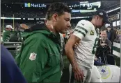  ?? ADAM HUNGER – THE ASSOCIATED PRESS ?? Aaron Rodgers is helped off the field after tearing an Achilles tendon on the fourth play of his New York Jets debut.