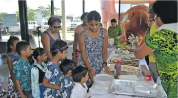  ?? Photo: Asco Motors ?? Asco Motors treat children of Loloma Home.