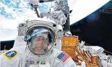  ??  ?? Spaceman: Mike Massimino on a repair mission to Hubble