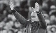  ??  ?? Jose Mourinho salutes the Manchester United fans at Everton.