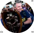  ?? ?? Paul Green with the NRL trophy after his Cowboys-coached team triumphed in 2015.
