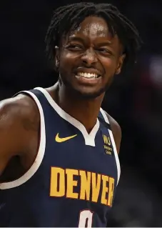  ?? Aaron Ontiveroz, The Denver Post ?? Jerami Grant is one of four sons of former NBA star Harvey Grant. Three play pro basketball.