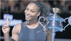  ?? AP ?? Serena Williams poses with the Australian Open trophy in 2017.