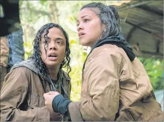  ??  ?? GINA RODRIGUEZ, right, and Thompson star in the sci-fi film set for release on Friday.